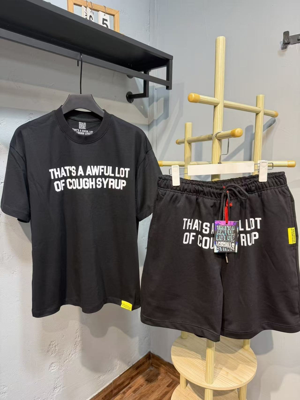 THAT'S A AWFUL LOT OF COUGH SYRUP Bold Wordmark Short-Sleeve Set ¡ª front